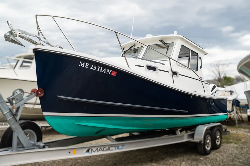 The Image of 2022 Eastern 248 Explorer boat on trailer, side view. - 1