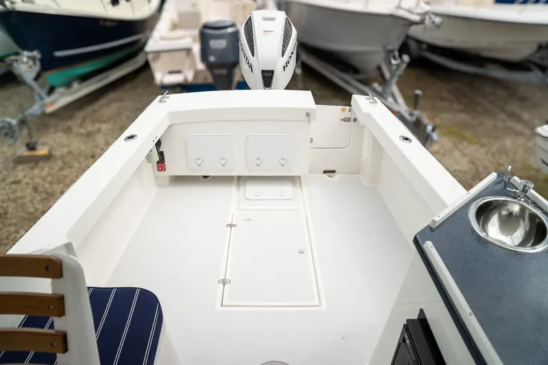 Slide: The Image of Interior view of a 2022 Eastern 248 Explorer boat. - 6