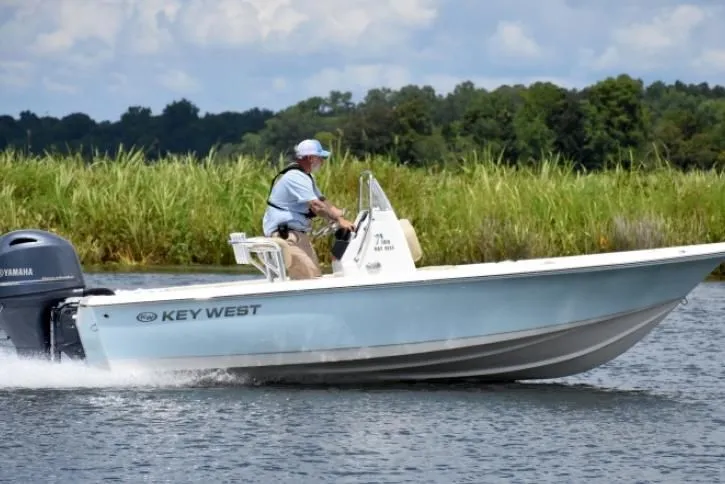 Slide: The Image of 2020 Key West 188 Bay Reef boat on a river. - 5