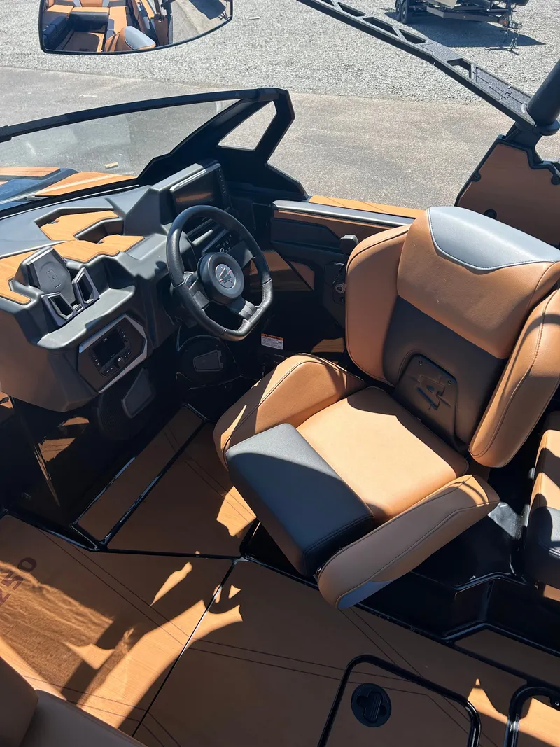 Slide: The Image of Interior of Axis T250 boat, 2026 model, featuring luxurious leather seating. - 11