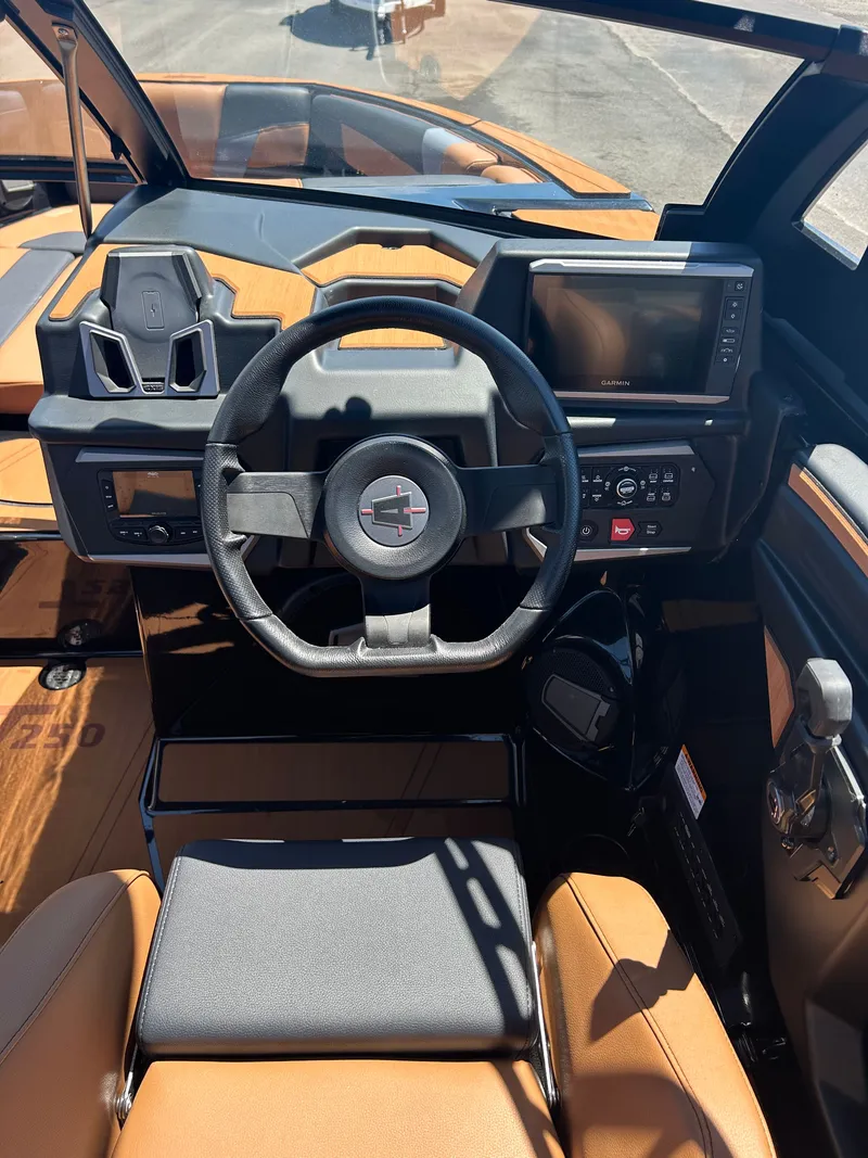 Slide: The Image of 2026 Axis T250 interior with modern dashboard and steering wheel. - 12