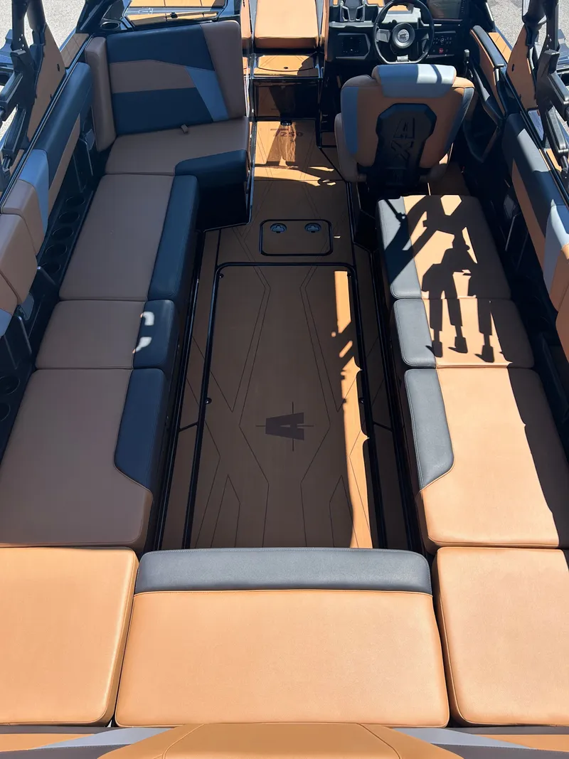 Slide: The Image of Interior of Axis T250 boat, 2026 model, featuring luxurious seating. - 5