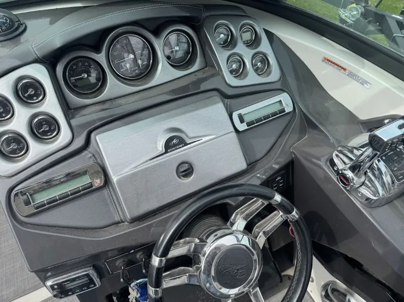 Slide: The Image of Dashboard of a 2011 Monterey 328SS Super Sport boat. - 10