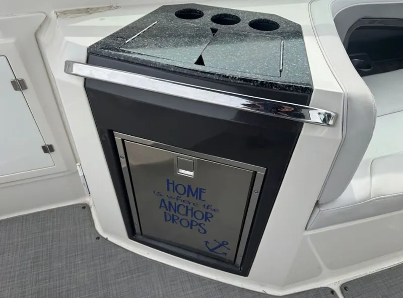 Slide: The Image of Monterey 328SS 2011 boat kitchenette with anchor quote. - 12