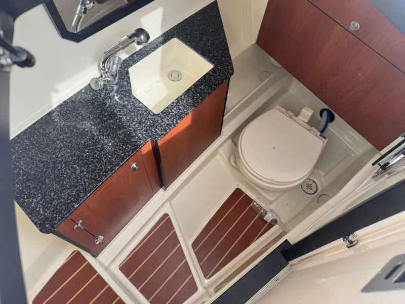 Slide: The Image of Interior of 2011 Monterey 328SS Super Sport with sink and toilet. - 14