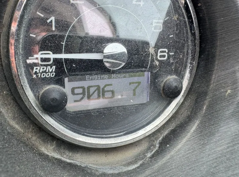 Slide: The Image of Monterey 328SS Super Sport 2011 tachometer showing 906.7 engine hours. - 18