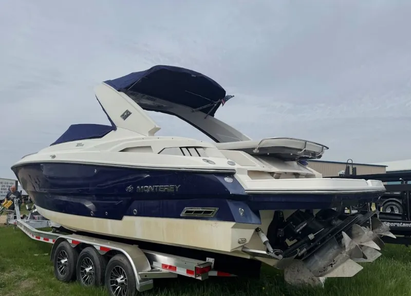 Slide: The Image of 2011 Monterey 328SS Super Sport boat on trailer. - 3