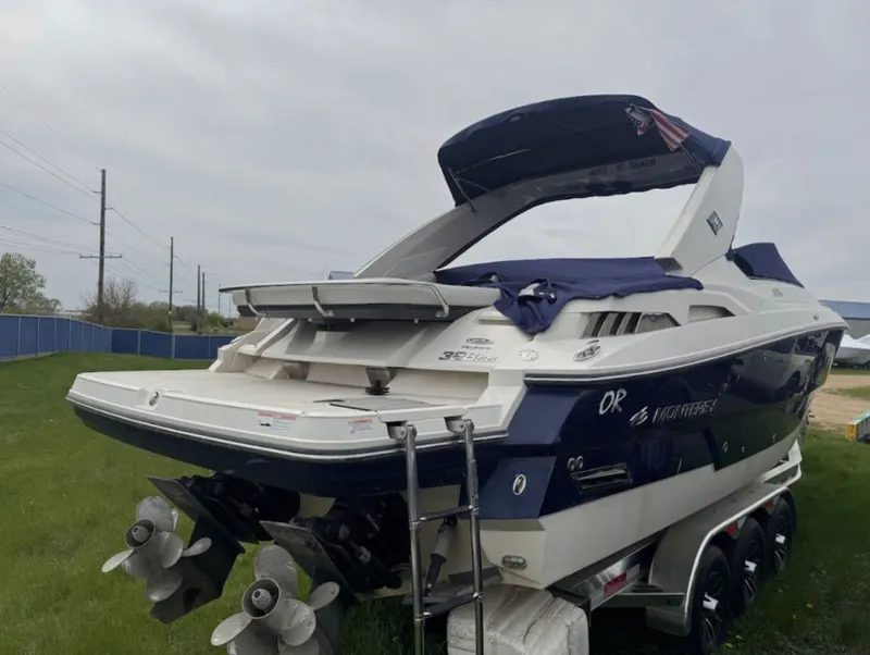 Slide: The Image of 2011 Monterey 328SS Super Sport boat on trailer, side view. - 4