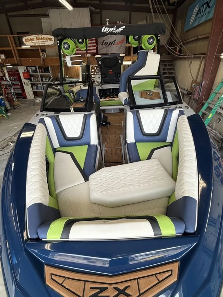 Slide: The Image of Interior of a 2020 Tigé 23ZX boat with modern seating. - 2