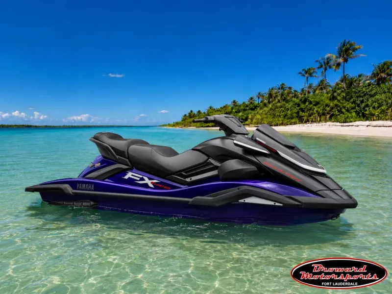 The Image of A 2026 Yamaha WaveRunner FX SVHO® sits in clear water near a tropical island. - 0