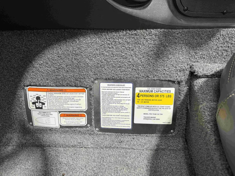 Slide: The Image of 2019 Tracker Pro Team 195 TXW capacity and warning labels. - 16