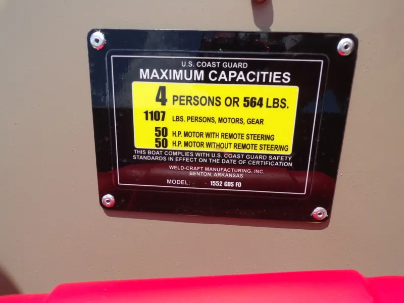 Slide: The Image of Weldcraft 1552 CDS FO boat capacity plate, 4 persons or 564 lbs, year 2026. - 16