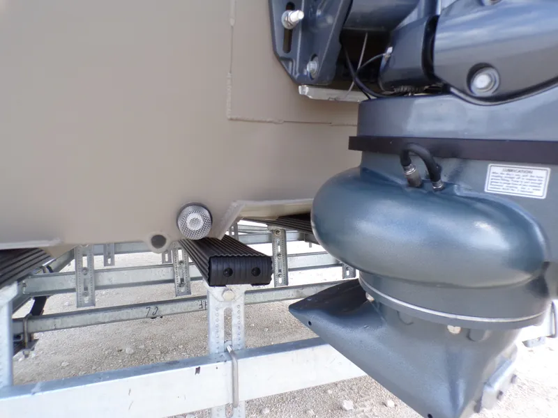 Slide: The Image of Close-up of 2026 Weldcraft 1850 MUVDD SP DLX CC FO boat motor. - 13