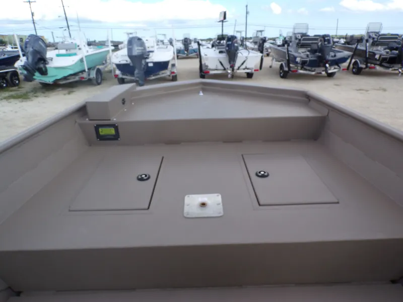 Slide: The Image of Weldcraft 1850 MUVDD SP DLX CC FO boat, 2026 model, in a parking lot. - 18
