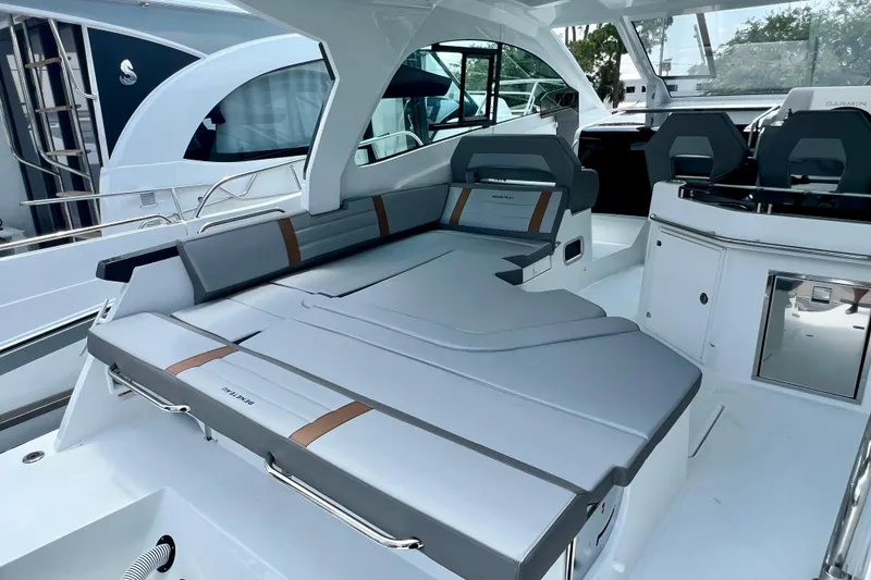 Slide: The Image of 2024 Beneteau Gran Turismo 32 yacht interior with sleek seating and modern design. - 23