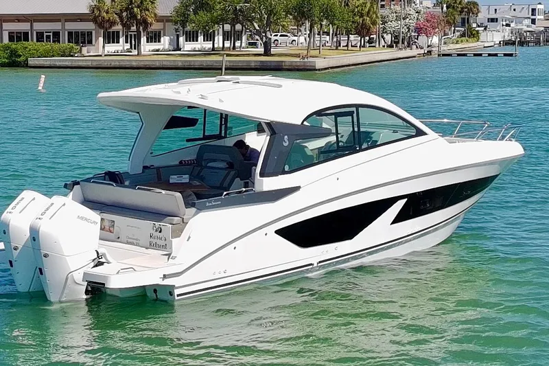 Slide: The Image of 2024 Beneteau Gran Turismo 32 yacht on turquoise water, showcasing sleek design and luxury features. - 33