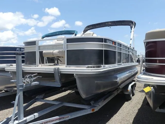 The Image of 2016 Bennington 21 SFX Premium pontoon boat on trailer. - 1