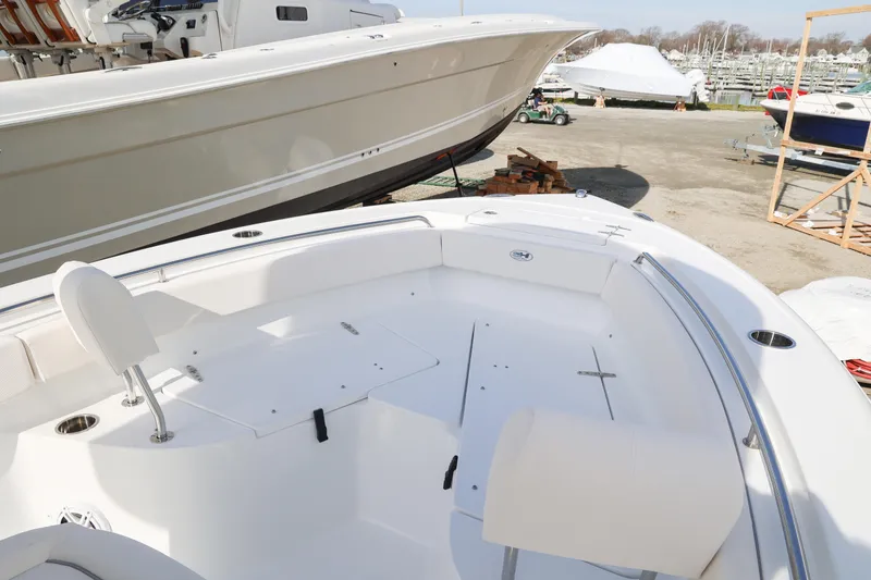 Slide: The Image of 2026 Sea Hunt Ultra 219 boat interior, featuring spacious seating and sleek design. - 6