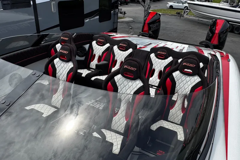 Slide: The Image of 2025 Performance Powerboats P420 interior with sleek, sporty seating and modern design. - 12
