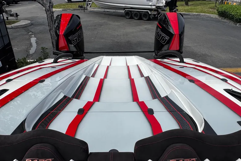Slide: The Image of 2025 Performance Powerboats P420 with dual engines, sleek red and white design. - 14