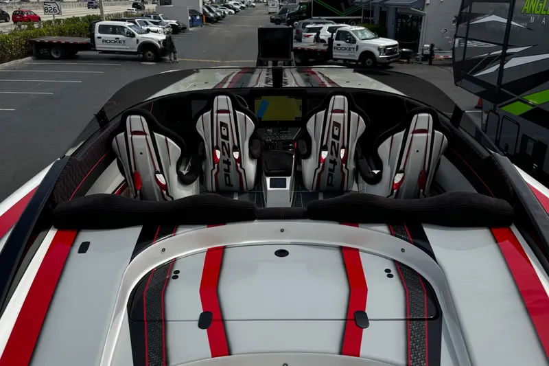 Slide: The Image of 2025 Performance Powerboats P420 interior with sleek seats and modern dashboard. - 16