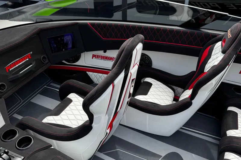 Slide: The Image of Interior of 2025 Performance Powerboats P420 with luxury seating and modern dashboard. - 22
