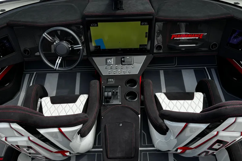 Slide: The Image of 2025 Performance Powerboats P420 cockpit with modern steering, dual seats, and advanced navigation display. - 23