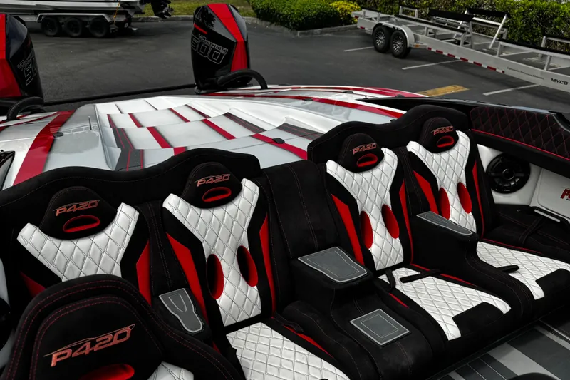 Slide: The Image of Interior of 2025 Performance Powerboats P420 with sleek, modern seating and stylish design. - 25