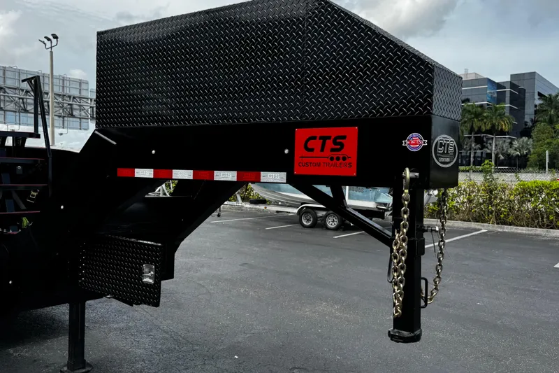 Slide: The Image of Trailer hitch of a 2025 Performance Powerboats P420 in a parking lot. - 31