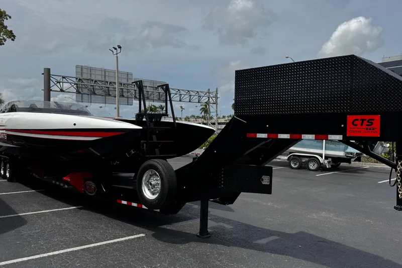 Slide: The Image of 2025 Performance Powerboats P420 on a CTS trailer in a parking lot. - 5