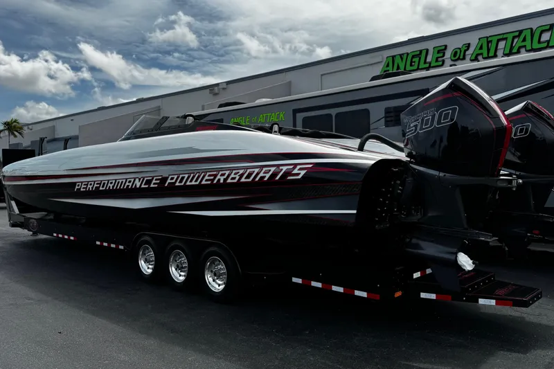 Slide: The Image of 2025 Performance Powerboats P420 on trailer, featuring sleek design and powerful engines. - 8