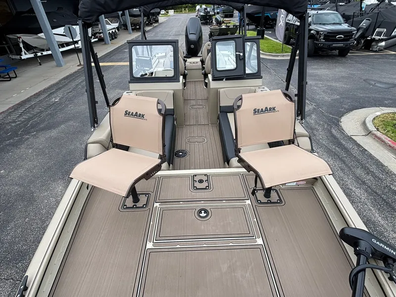 Slide: The Image of 2026 SeaArk Easy Cat boat with beige seats and modern design. - 10