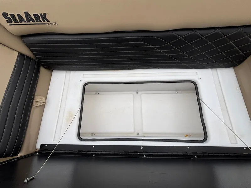 Slide: The Image of SeaArk Easy Cat 2026 boat seat with storage compartment. - 19