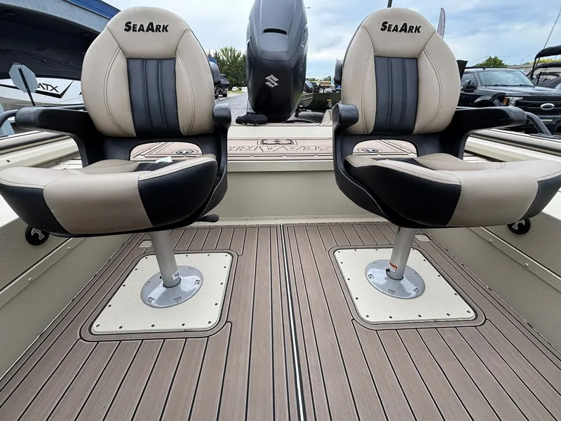 Slide: The Image of 2026 SeaArk Easy Cat boat with swivel seats and Suzuki motor. - 22