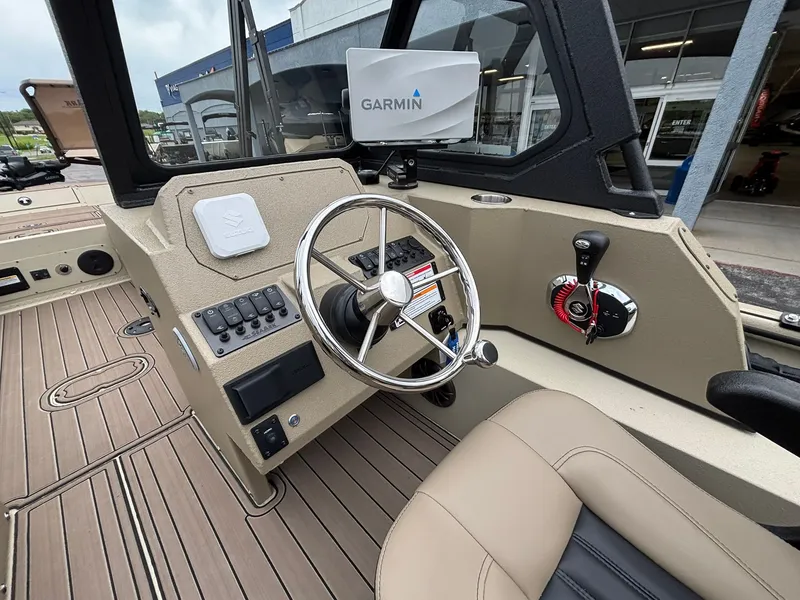 Slide: The Image of Interior of 2026 SeaArk Easy Cat with Garmin navigation system. - 26