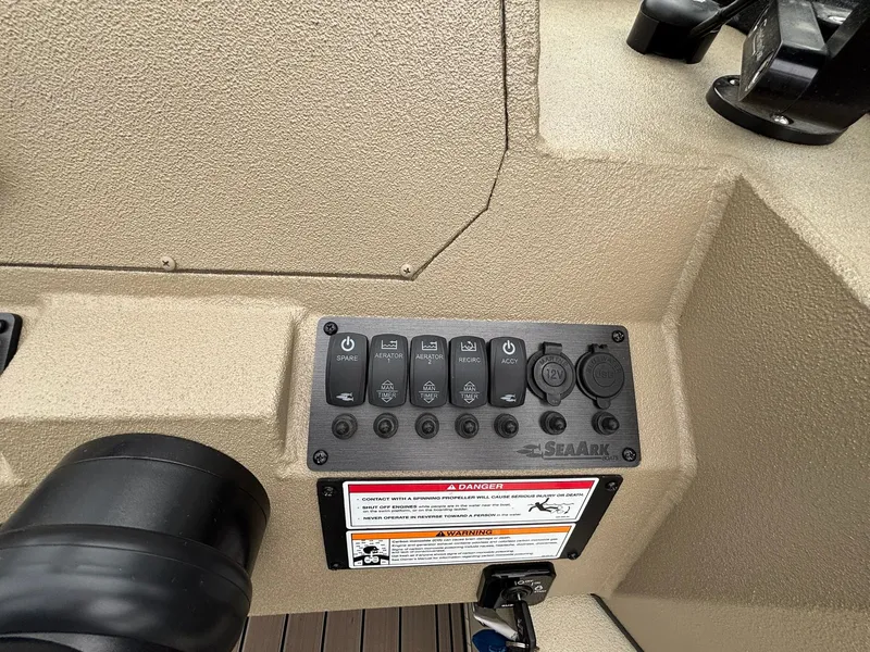 Slide: The Image of SeaArk Easy Cat 2026 control panel with switches and warning labels. - 28