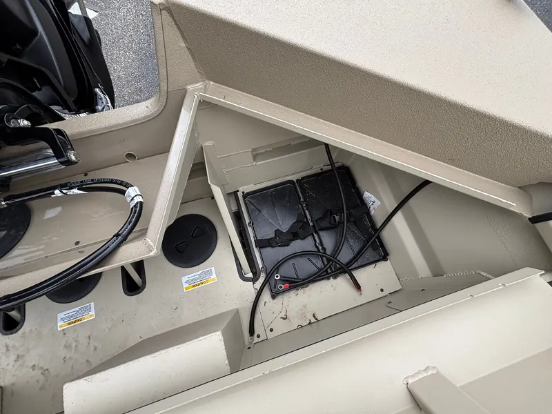 Slide: The Image of Interior view of SeaArk Easy Cat 2026 with battery compartment. - 35
