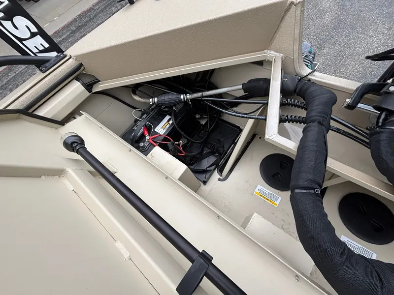 Slide: The Image of Interior view of SeaArk Easy Cat 2026 with battery and cables. - 36