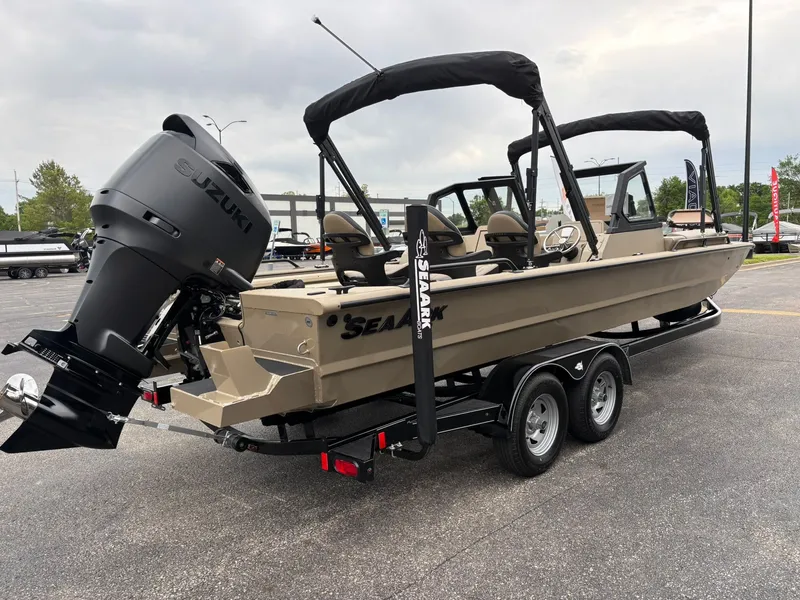 Slide: The Image of 2026 SeaArk Easy Cat boat with Suzuki motor on trailer. - 5