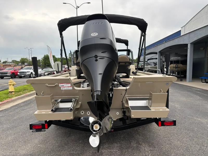 Slide: The Image of Rear view of a 2026 SeaArk Easy Cat boat with outboard motor. - 6
