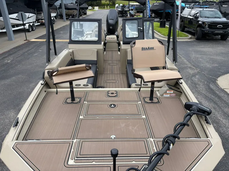 Slide: The Image of 2026 SeaArk Easy Cat boat with spacious deck and seating. - 8