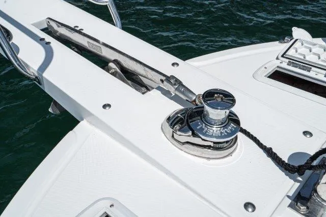 Slide: The Image of Bow of 2011 Skipjack 300 Flybridge with anchor winch and marine equipment. - 22