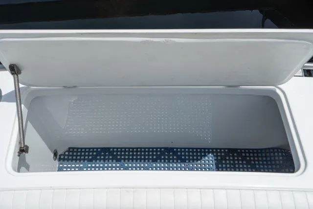 Slide: The Image of Open storage compartment on 2011 Skipjack 300 Flybridge boat. - 36
