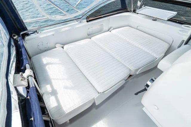 Slide: The Image of Luxurious seating area on a 2011 Skipjack 300 Flybridge boat. - 55