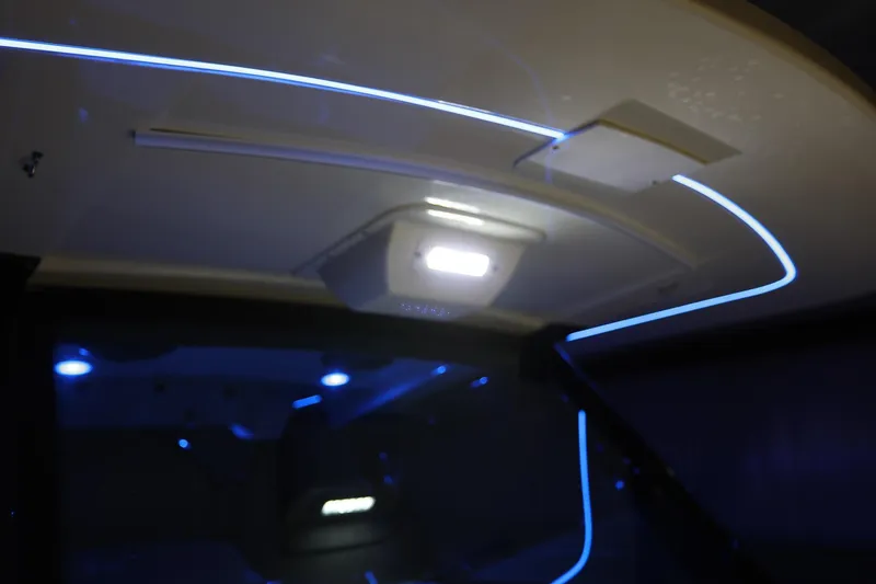 Slide: The Image of Interior lighting of 2022 Scout 330 LXF boat with modern LED accents. - 43
