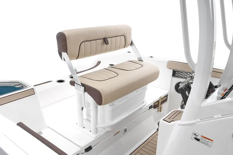 Slide: The Image of Manufacturer Provided Image: 2026 Yamaha Boats 222 FSH Sport E interior seating, featuring beige cushioned bench. - 47