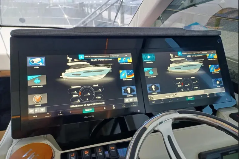Slide: The Image of Dashboard of 2023 Regal 42 FXO yacht with dual Garmin displays. - 23