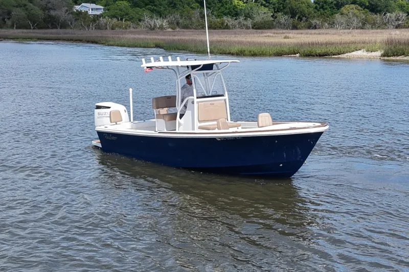 The Image of 2022 Pair Customs 21 Center Console DV boat on calm water. - 0