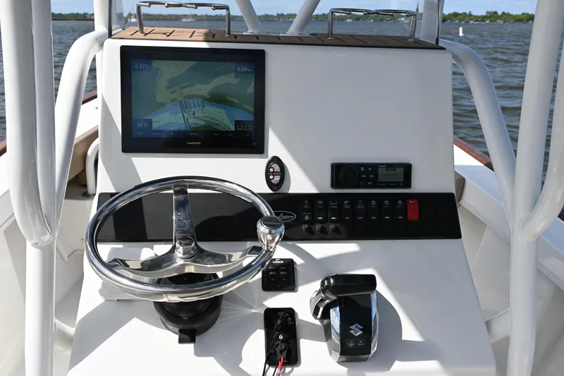 Slide: The Image of Center console of 2022 Pair Customs 21 Center Console DV boat with navigation display. - 15