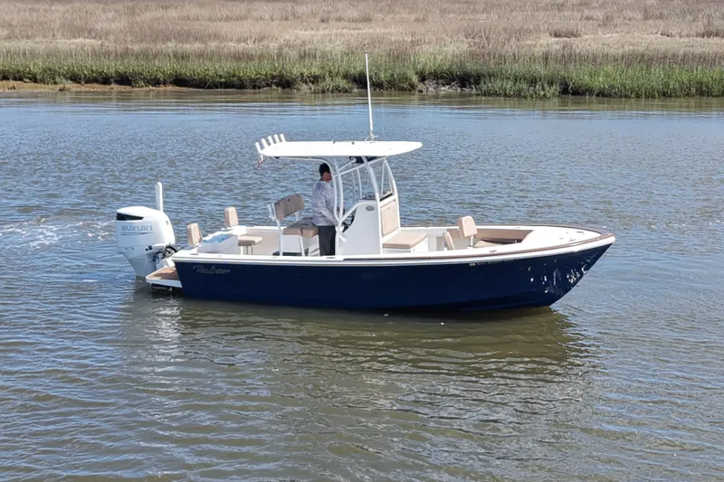 Slide: The Image of 2022 Pair Customs 21 Center Console DV boat on calm water. - 5